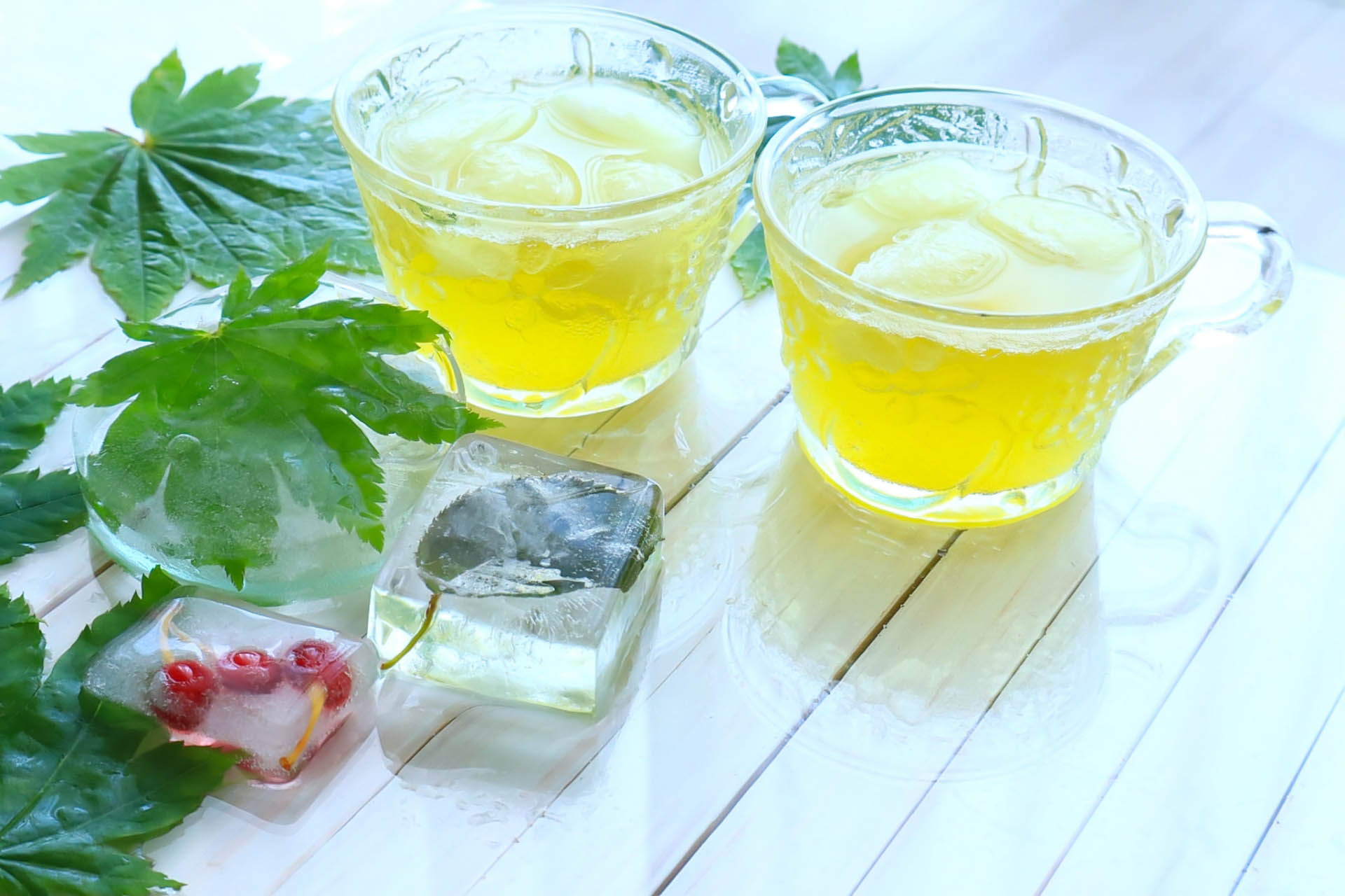 Tea harvest scene with workers picking fresh green tea leaves in Japan